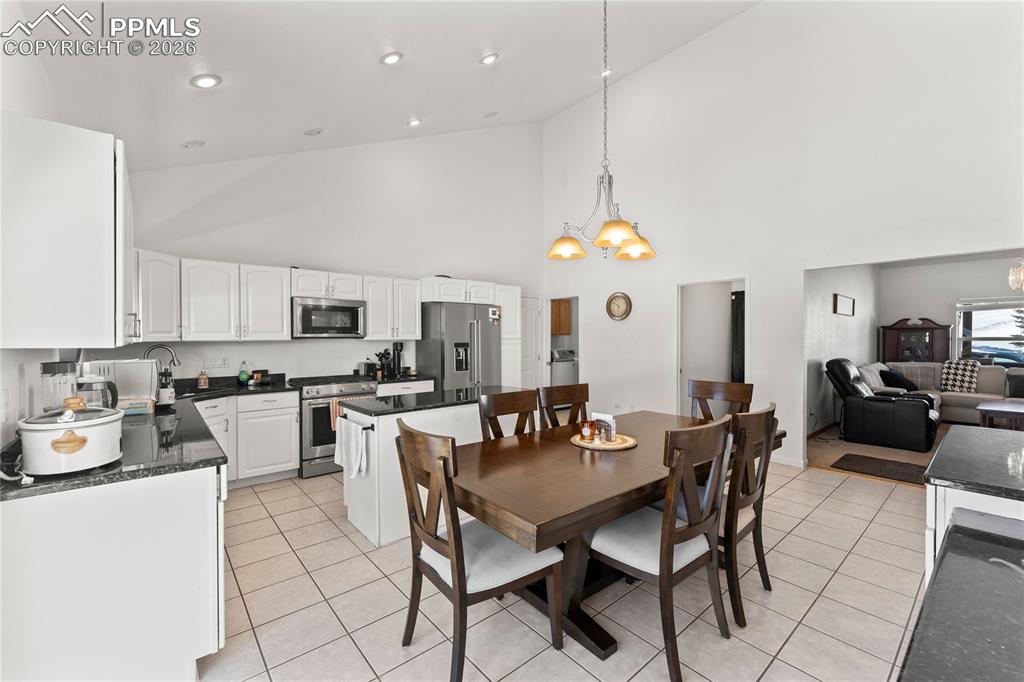 112 Ridge Point Circle Divide, CO 80814 - Photo 16 of 50 a view of a dining room with furniture