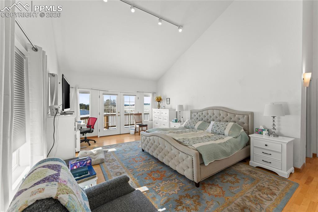 112 Ridge Point Circle Divide, CO 80814 - Photo 24 of 50 a bedroom with a bed and a couch