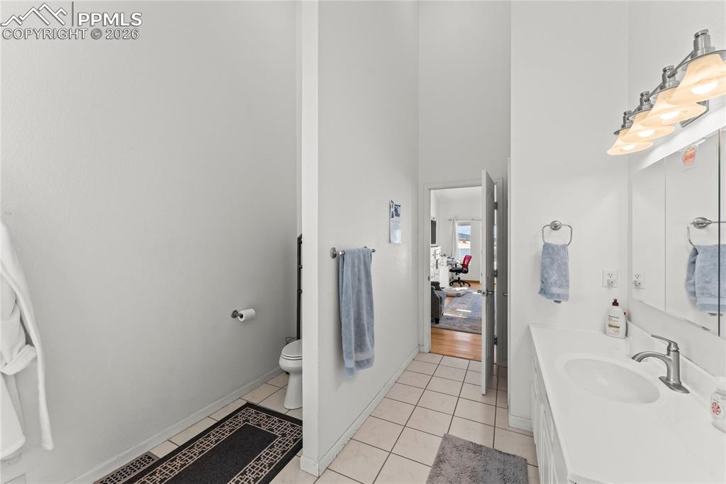 112 Ridge Point Circle Divide, CO 80814 - Photo 28 of 50 a bathroom with a sink a toilet and shower