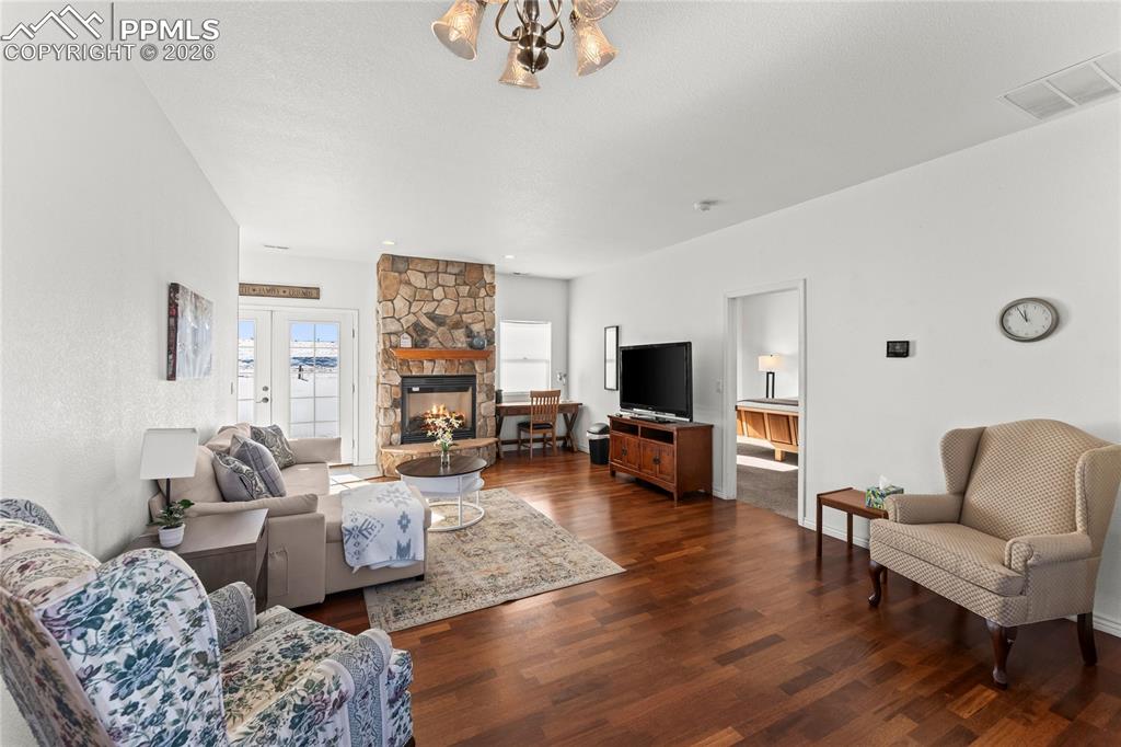 112 Ridge Point Circle Divide, CO 80814 - Photo 36 of 50 a living room with furniture or couch and a flat screen tv