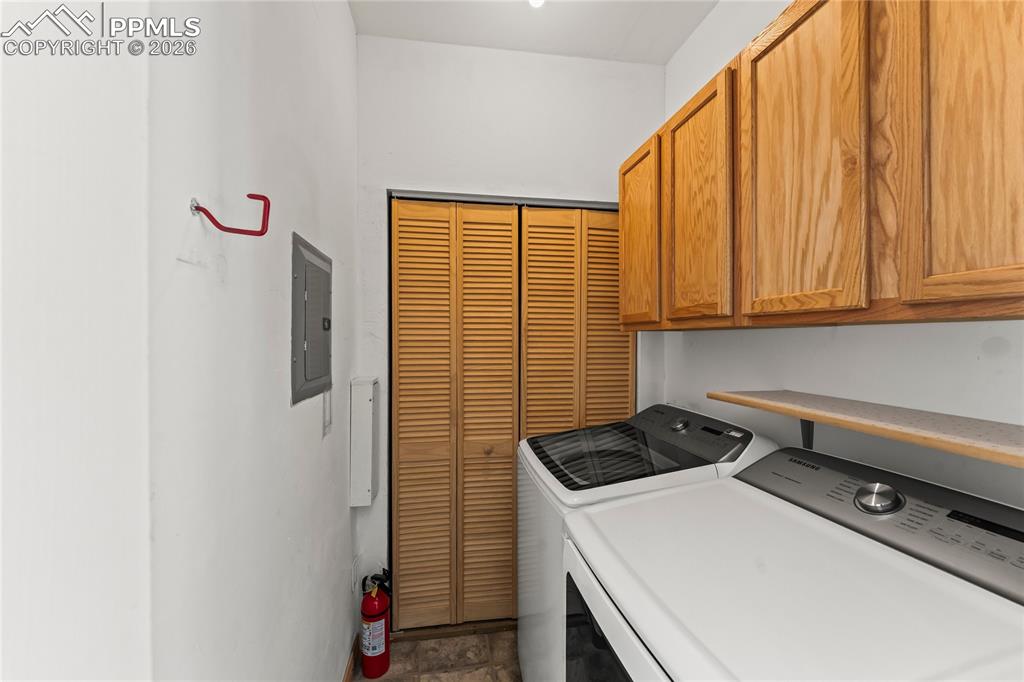 112 Ridge Point Circle Divide, CO 80814 - Photo 42 of 50 a room with storage and utility