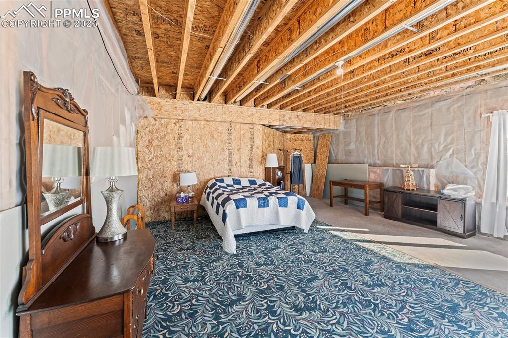 112 Ridge Point Circle Divide, CO 80814 - Photo 45 of 50 a living room with furniture and a flat screen tv