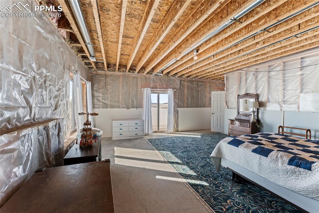112 Ridge Point Circle Divide, CO 80814 - Photo 46 of 50 a living room with furniture and a chandelier