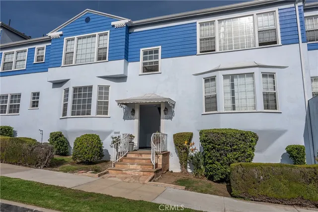 a front view of a house having yard