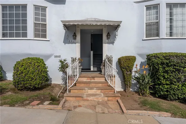 a view of entrance of building and potted plant