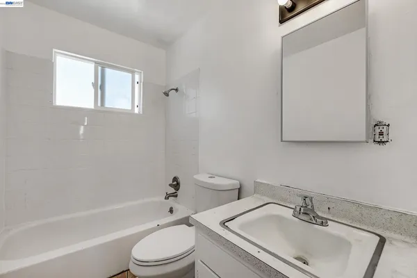 a view of a balcony with wooden floor and stairs