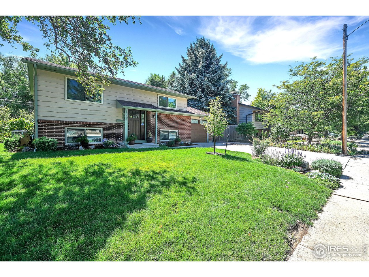 a house view with a garden space