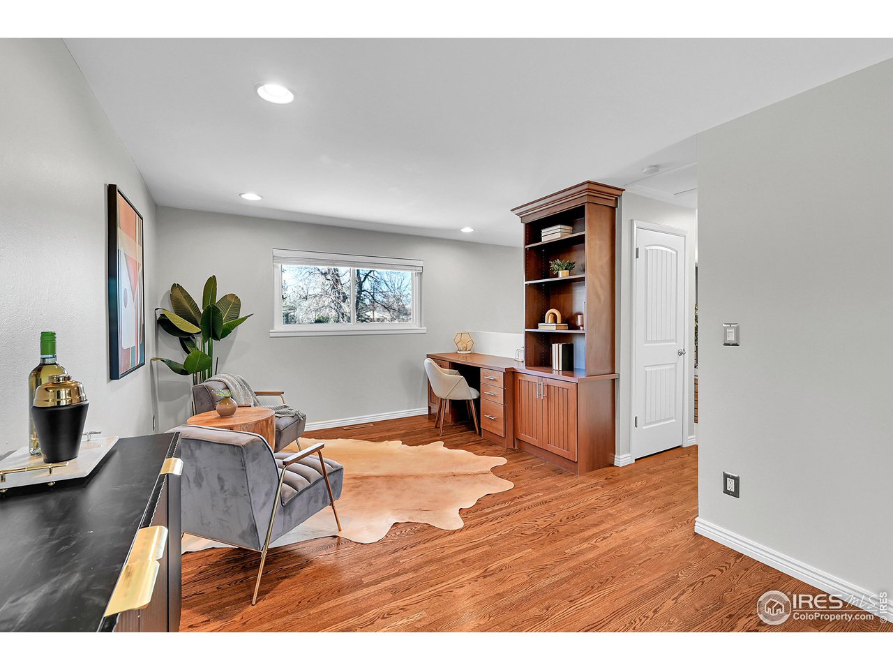 4216 Evans Drive Boulder, CO 80303 - Photo 12 of 26 a living room with furniture and wooden floor