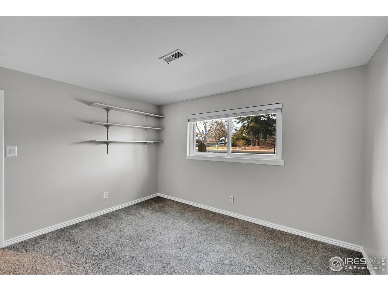 4216 Evans Drive Boulder, CO 80303 - Photo 19 of 26 an empty room with shelves