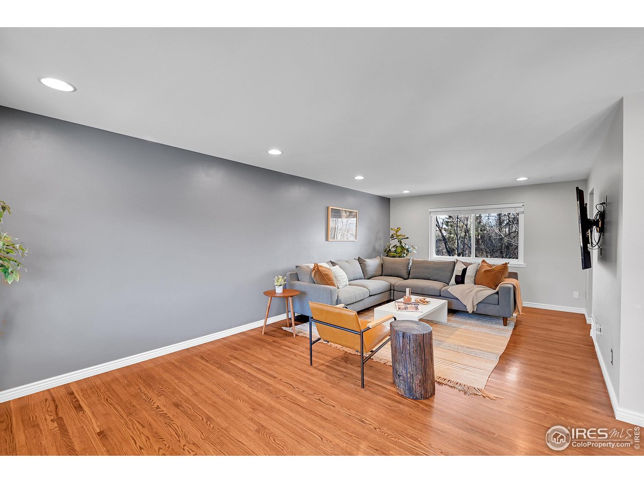 4216 Evans Drive Boulder, CO 80303 - Photo 4 of 26 a living room with furniture and a wooden floor
