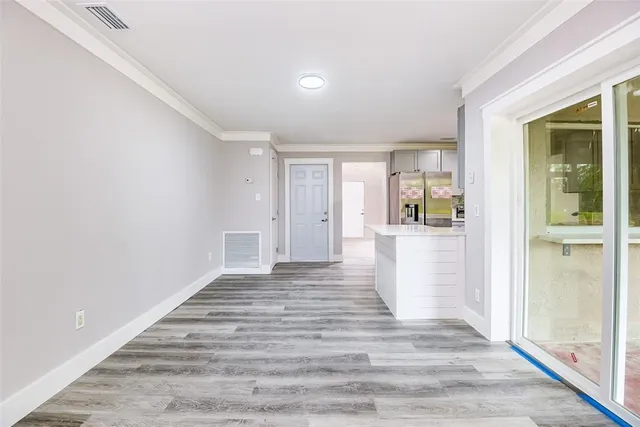 a view of an empty room and window