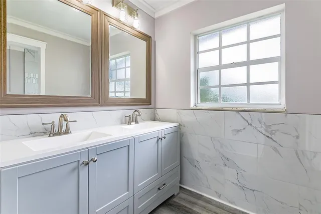 a bathroom with a sink and a vanity
