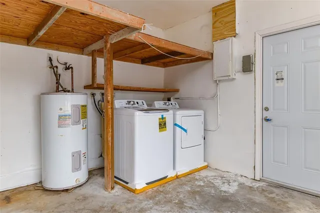a view of a storage & utility room with a washer and dryer