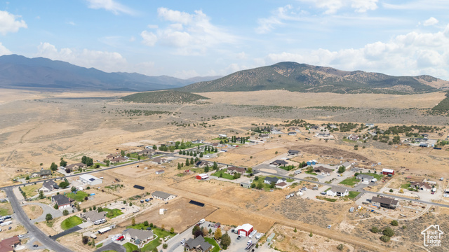 2974 West Ridgeline Road, Unit 85 Stockton, UT 84071 - Photo 21 of 23 Aerial view of property and surrounding area with mountains and rural landscape