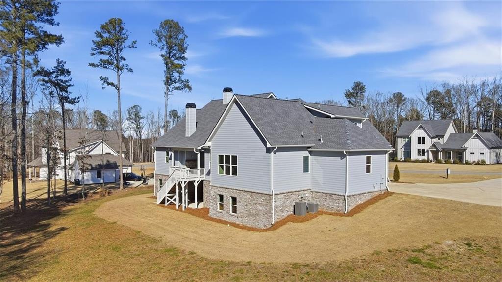 216 Ewing Way Dacula, GA 30019 - Photo 77 of 80 an aerial view of a house with a yard