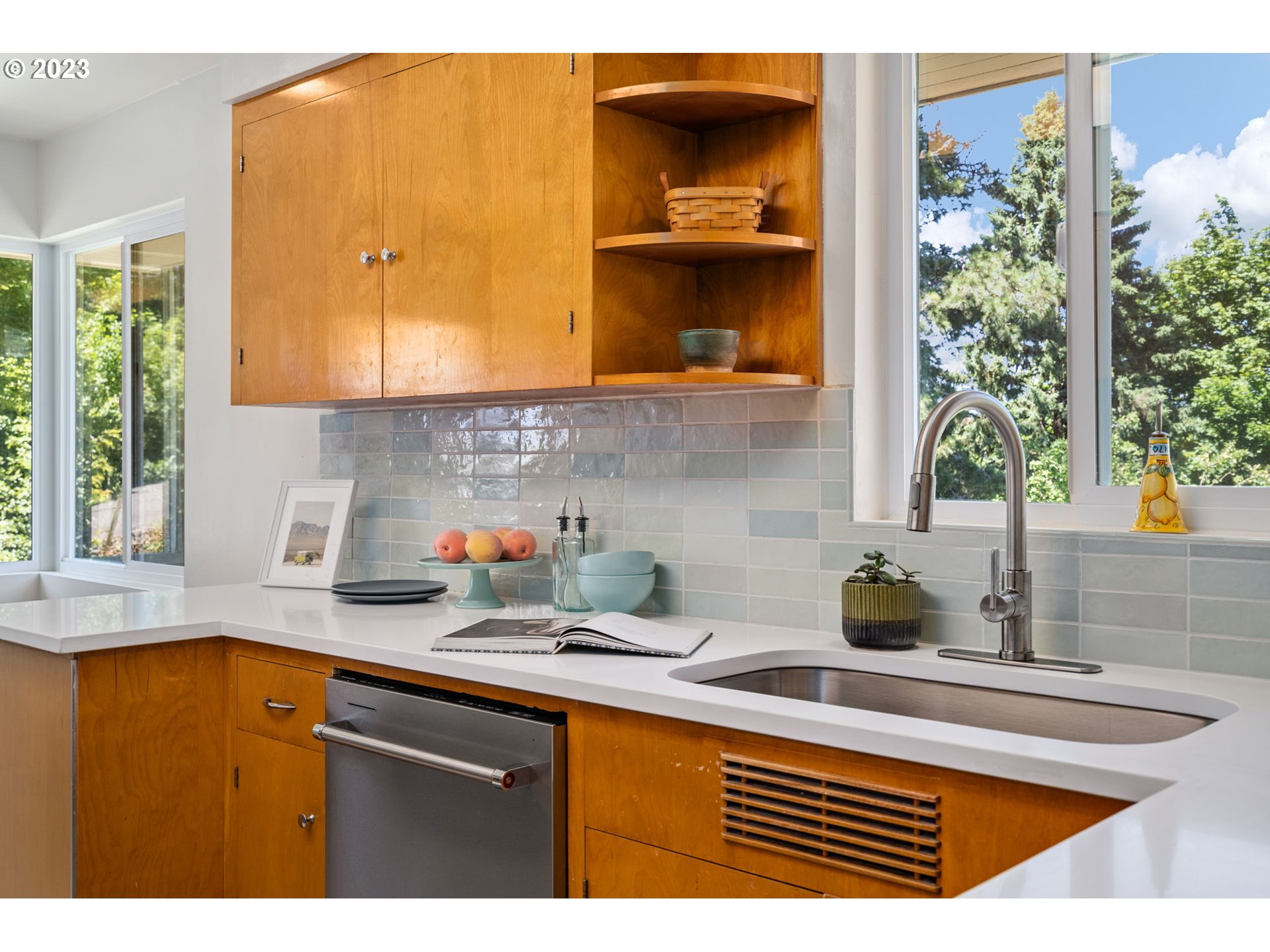 12050 Southwest 29th Avenue Portland, OR 97219 - Photo 11 of 36 a kitchen with a sink and cabinets