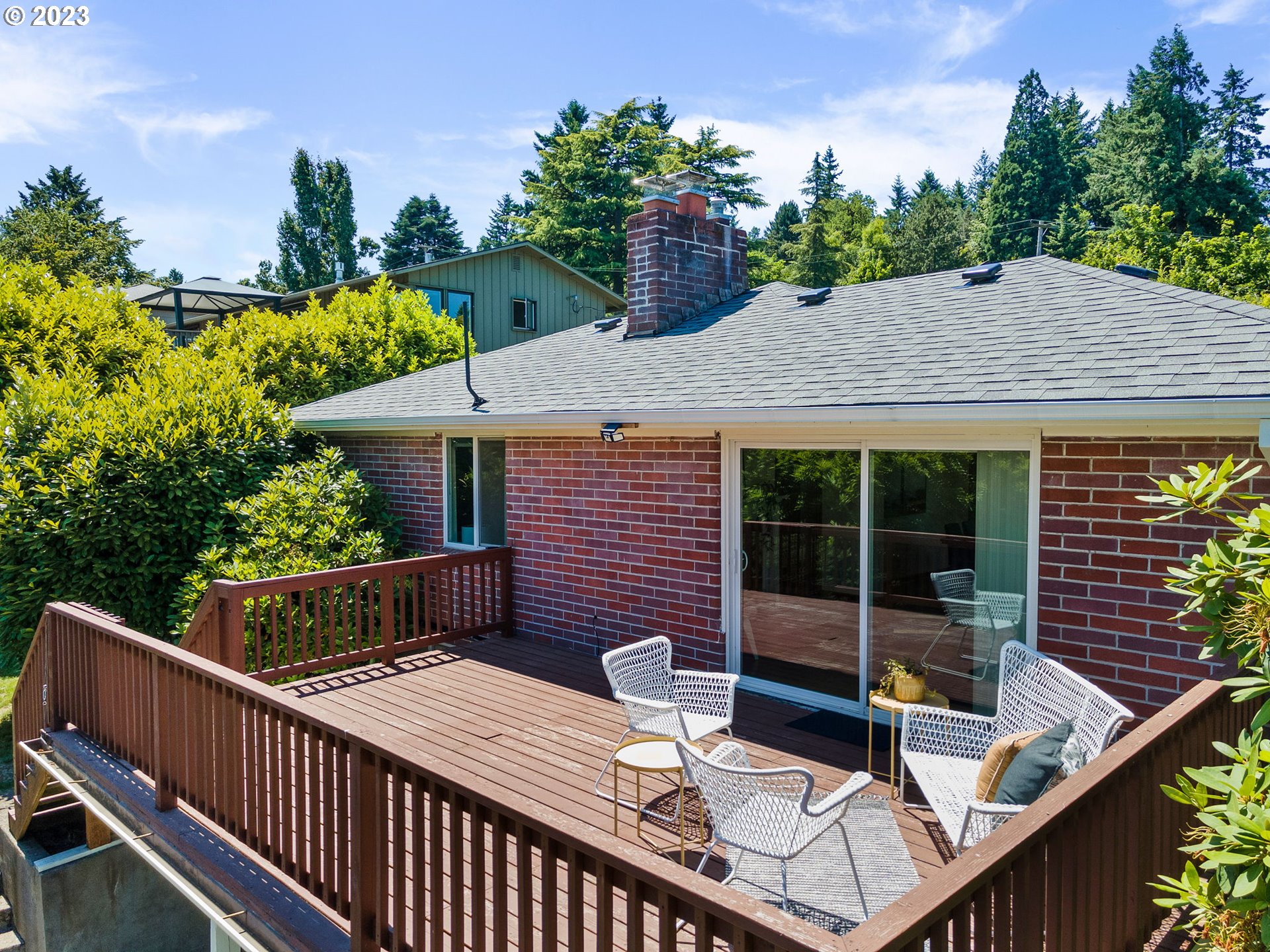 12050 Southwest 29th Avenue Portland, OR 97219 - Photo 29 of 36 a view of a roof deck with wooden floor and fence