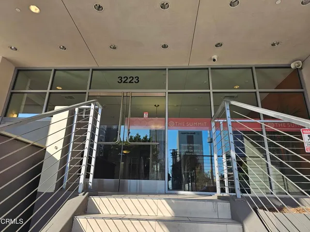 a view of a balcony with a door