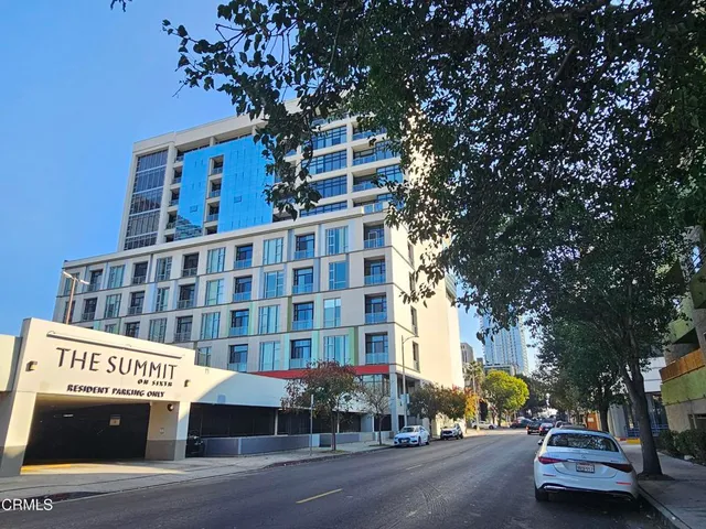 a front view of a building with street view