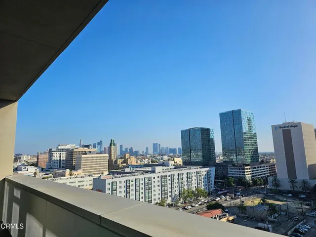 a view of a city with tall buildings