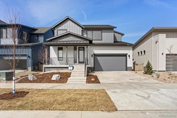 a front view of a house with entertaining space