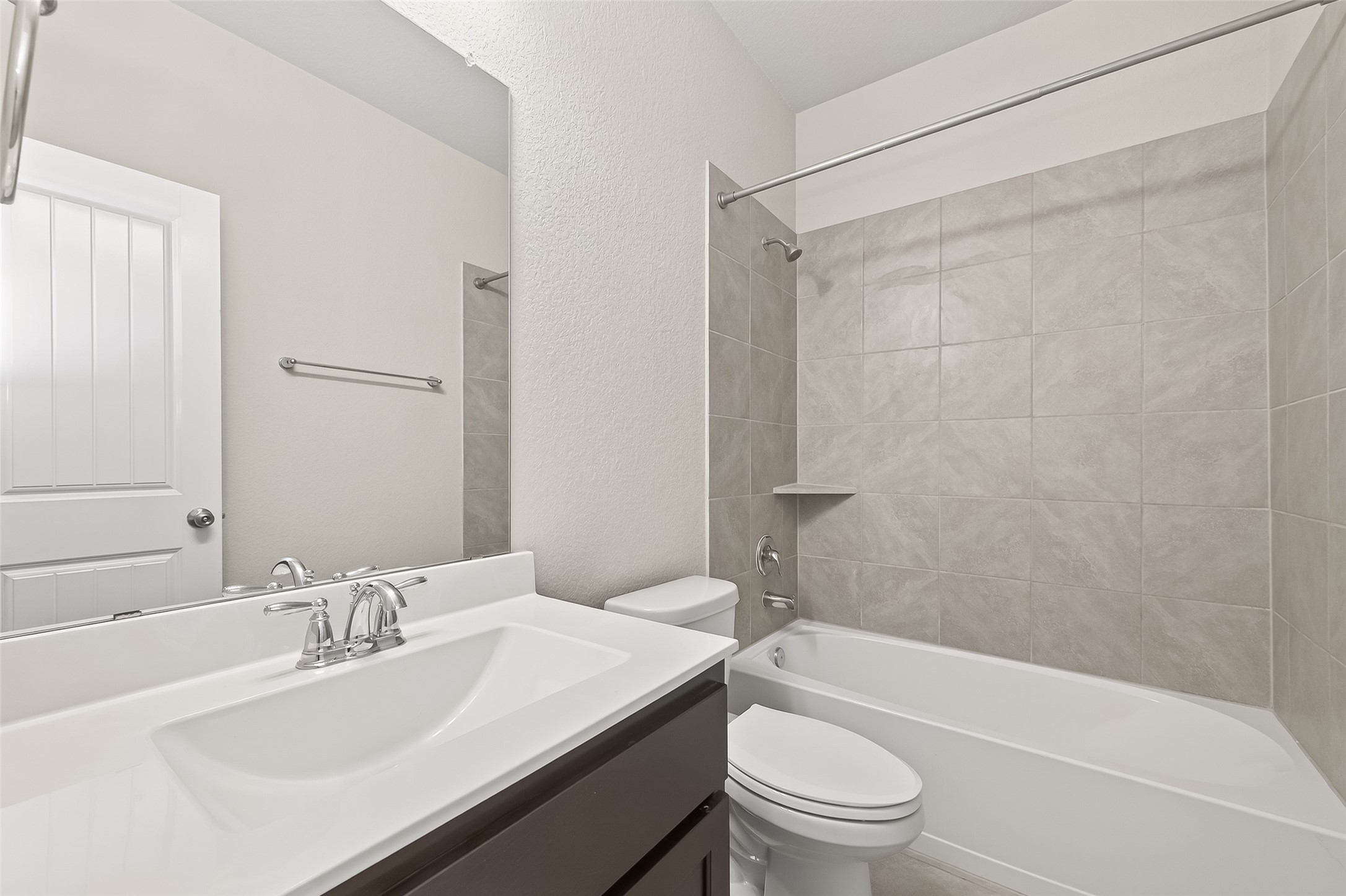 219 Verde Lake Way Rosenberg, TX 77469 - Photo 19 of 19 a bathroom with a sink a toilet and a bathtub