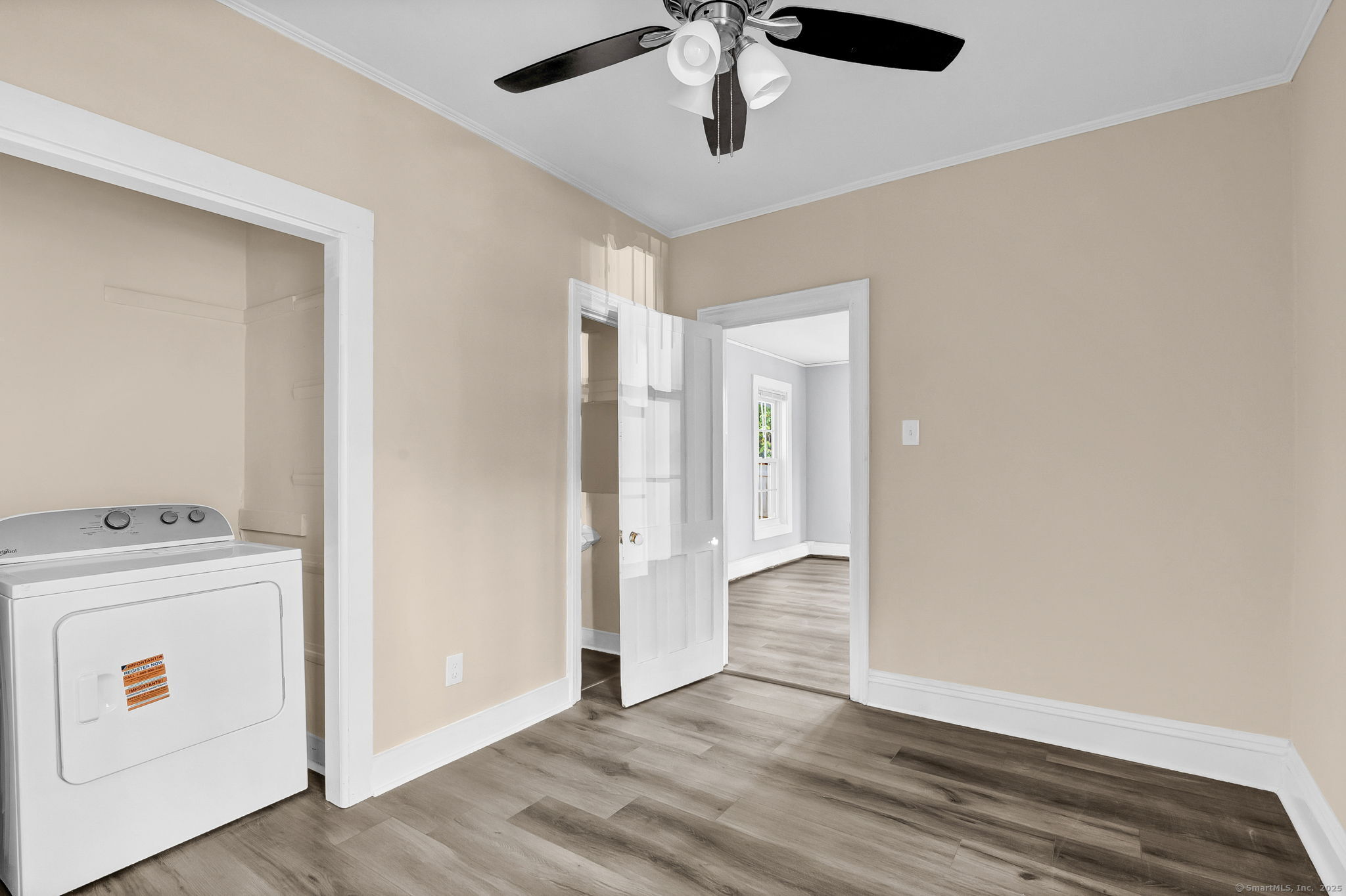 89 Spring Street Windham, CT 06226 - Photo 16 of 36 a view of a livingroom with washer and dryer