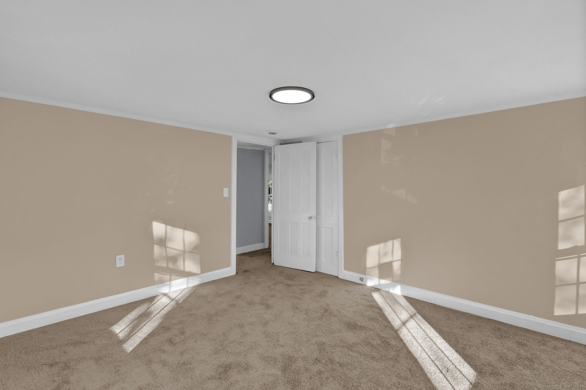 89 Spring Street Windham, CT 06226 - Photo 27 of 36 a view of a room with wooden floor and window