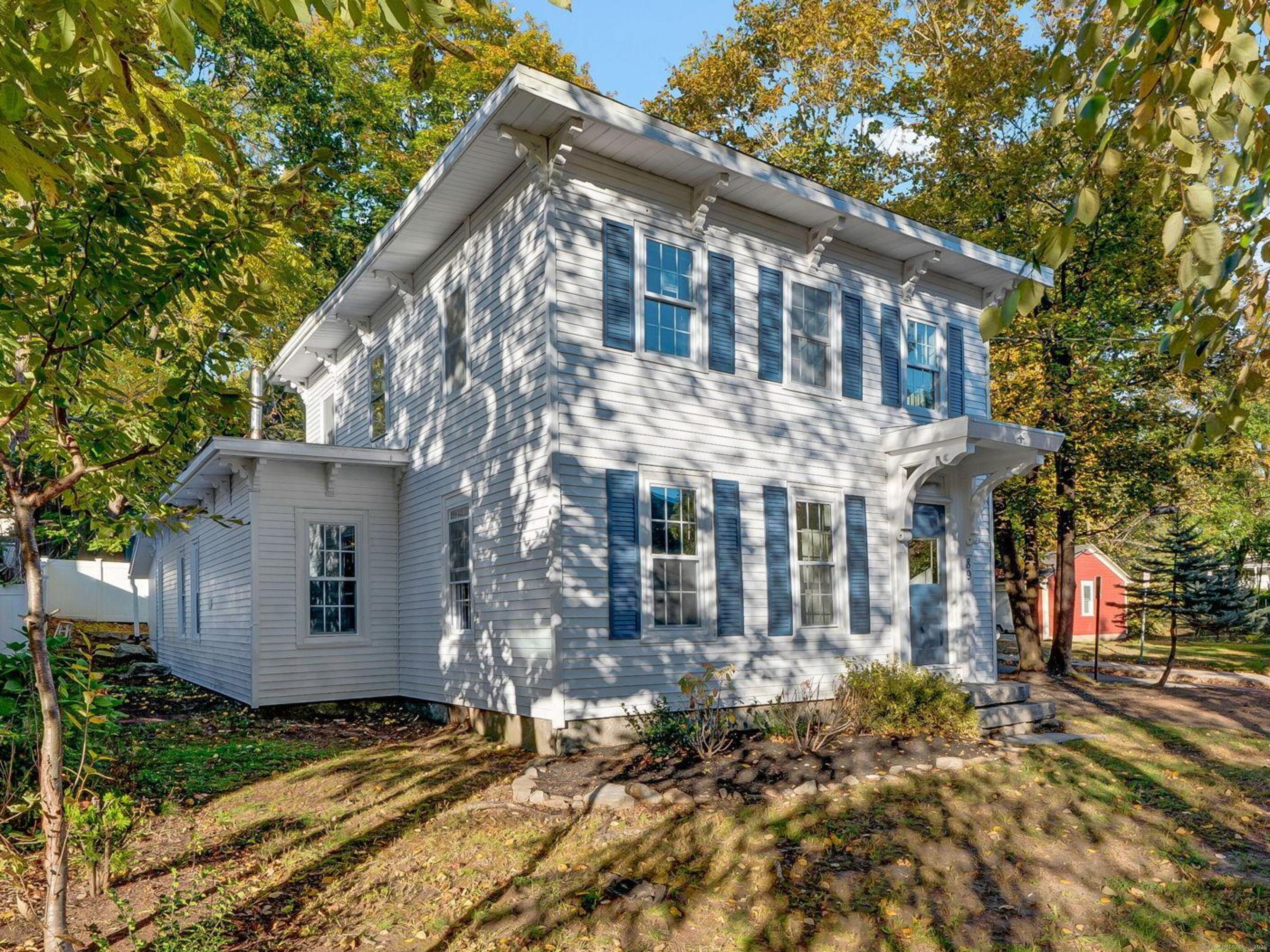 89 Spring Street Windham, CT 06226 - Photo 36 of 36 a view of a house with a yard