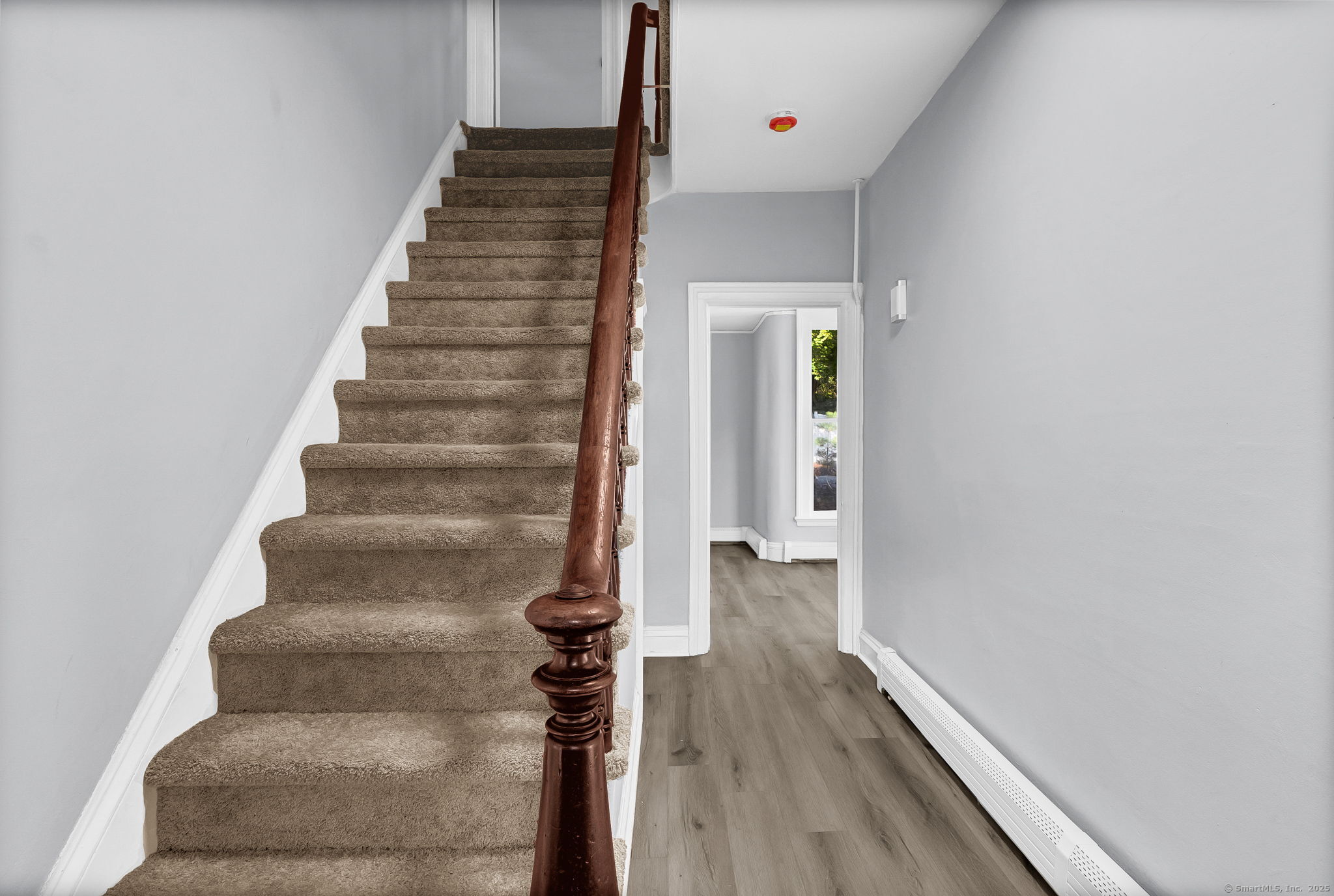 89 Spring Street Windham, CT 06226 - Photo 9 of 36 a view of an entryway with wooden floor