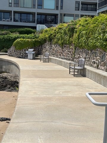 31 Constitution Way, Unit 31 Marblehead, MA 01945 - Photo 27 of 30 a view of a swimming pool with a patio