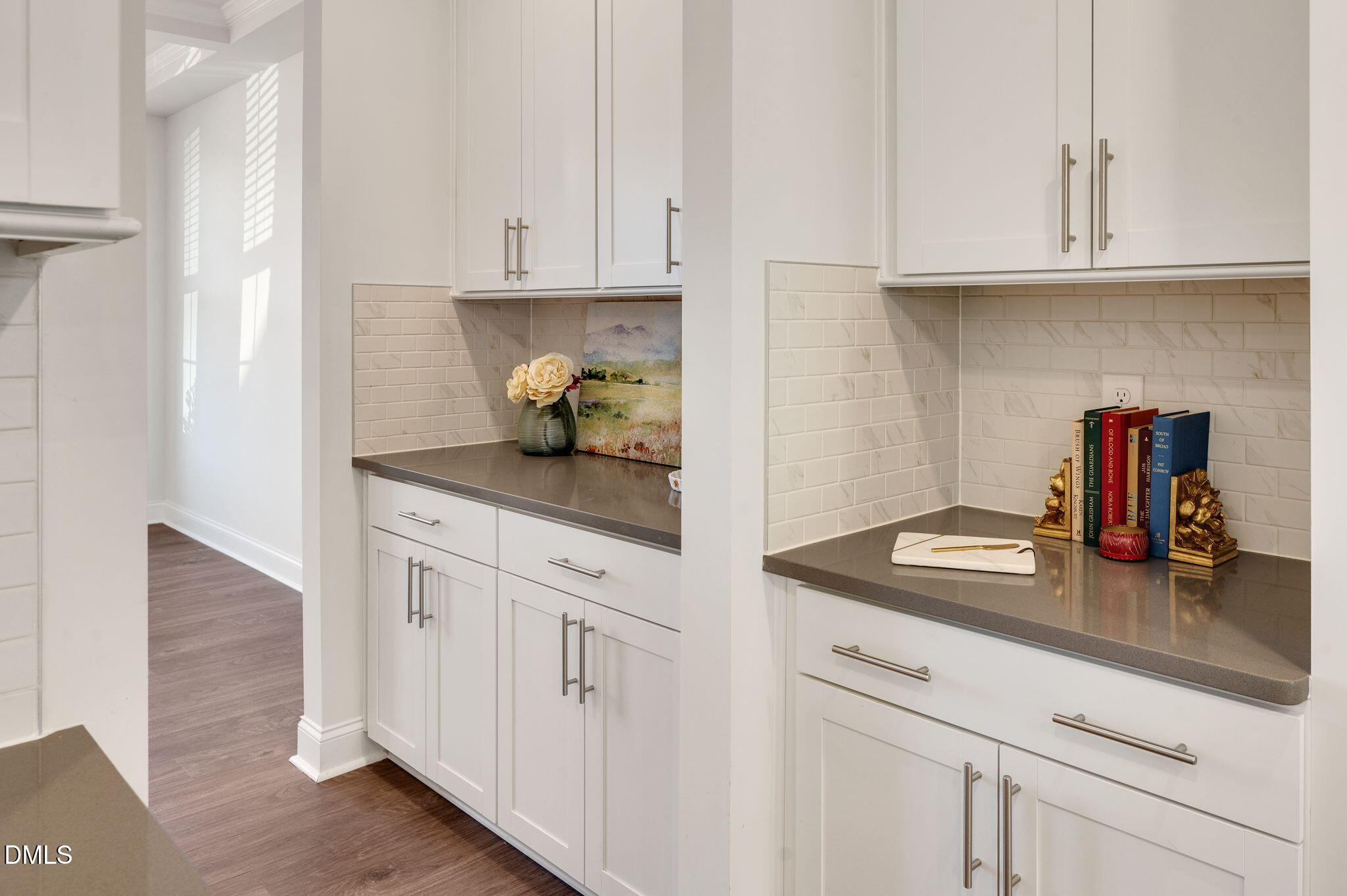 5112 Lizard Tail Lane Raleigh, NC 27603 - Photo 10 of 51 a kitchen with white cabinets and a sink