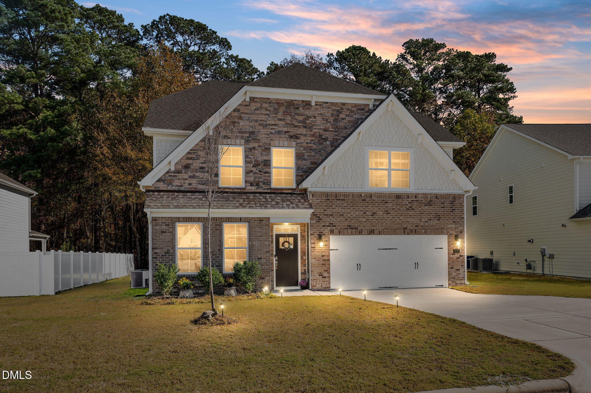 5112 Lizard Tail Lane Raleigh, NC 27603 - Photo 2 of 51 a front view of a house with a yard