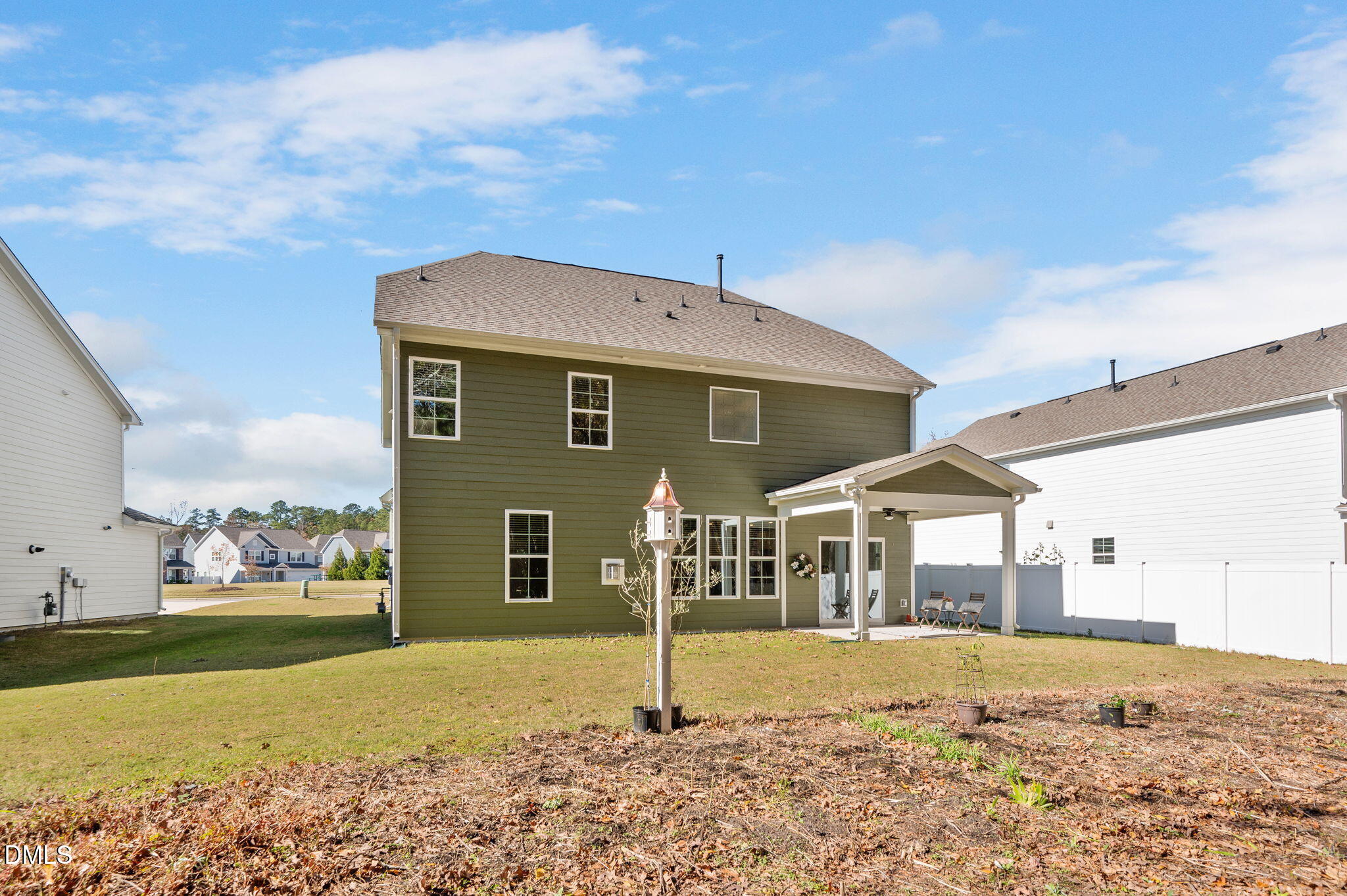 5112 Lizard Tail Lane Raleigh, NC 27603 - Photo 39 of 51 a front view of a house with a yard