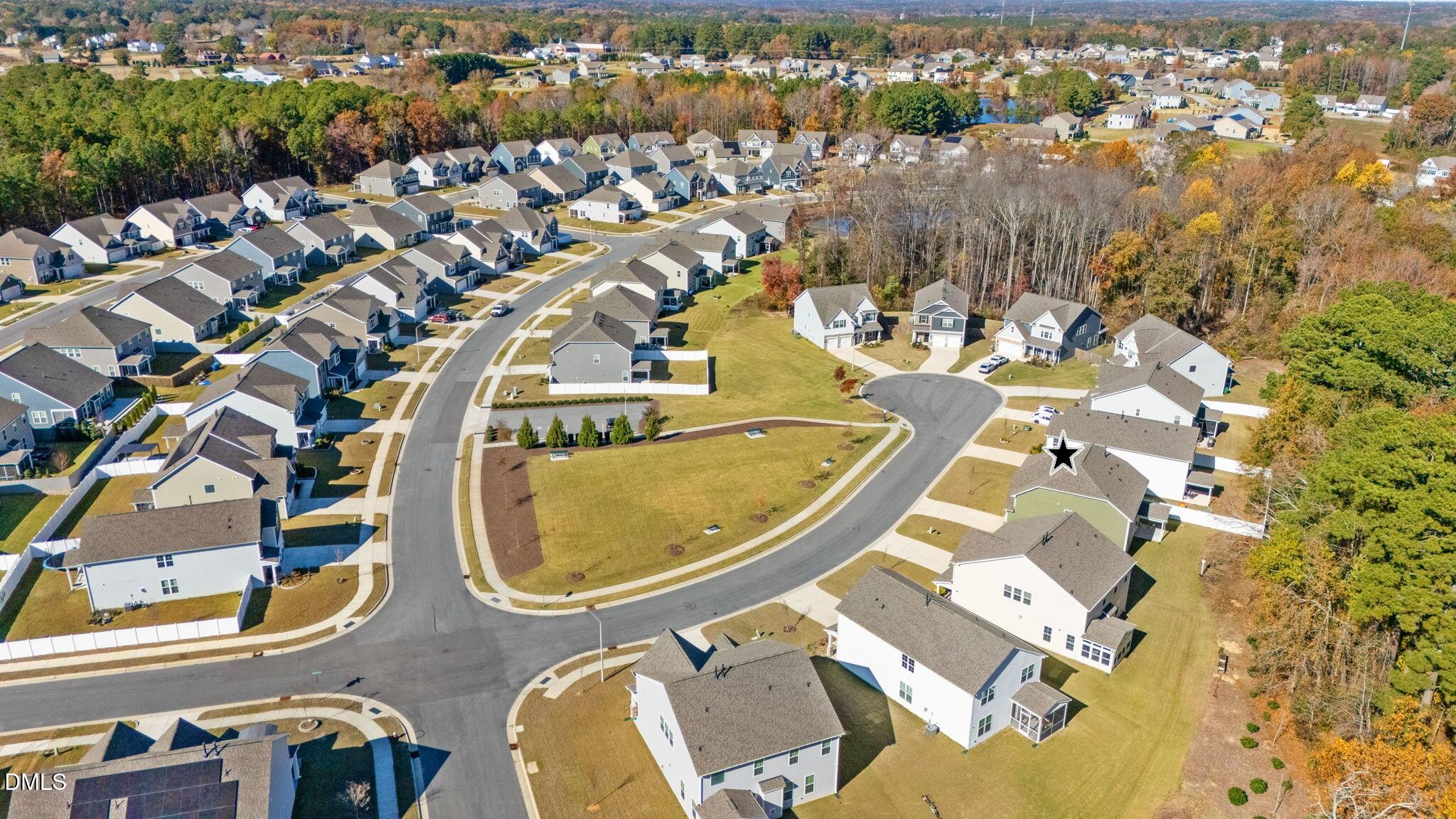 5112 Lizard Tail Lane Raleigh, NC 27603 - Photo 46 of 51 an aerial view of a swimming pool and outdoor space
