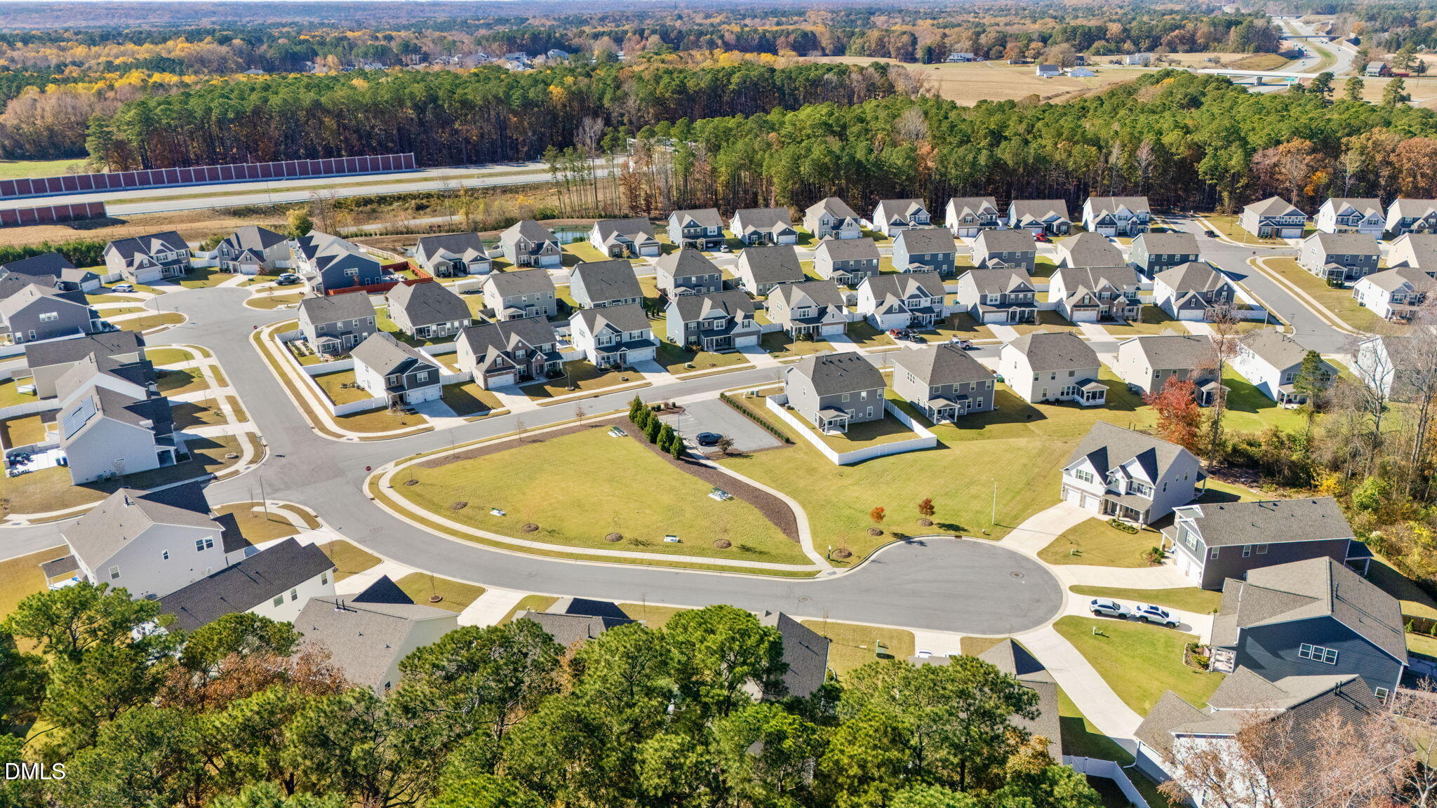 5112 Lizard Tail Lane Raleigh, NC 27603 - Photo 47 of 51 an aerial view of a house with a lake view