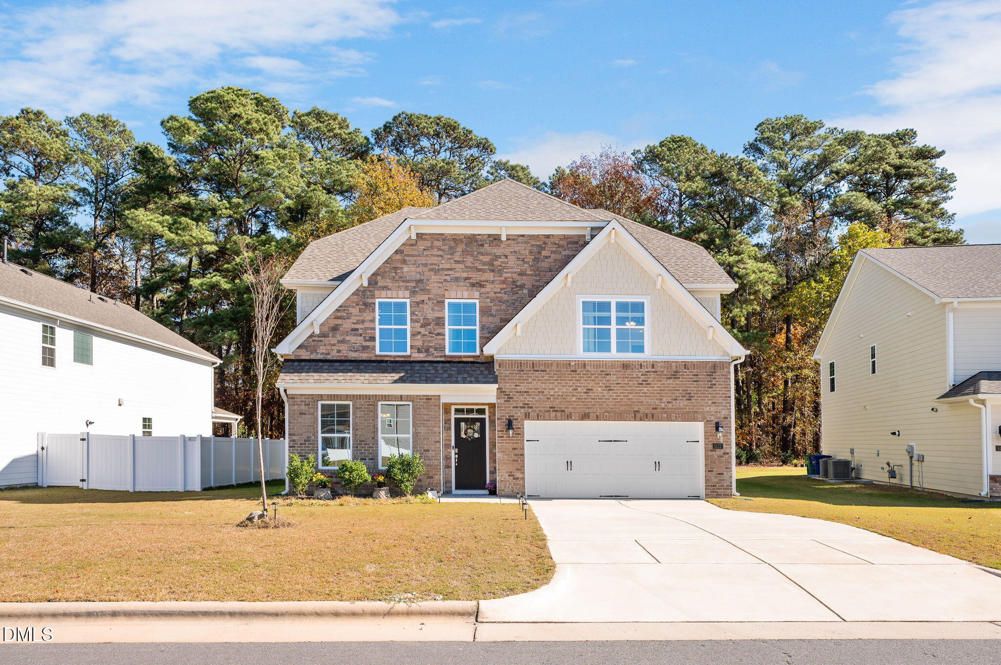 5112 Lizard Tail Lane Raleigh, NC 27603 - Photo 4 of 51 a front view of a house with a yard