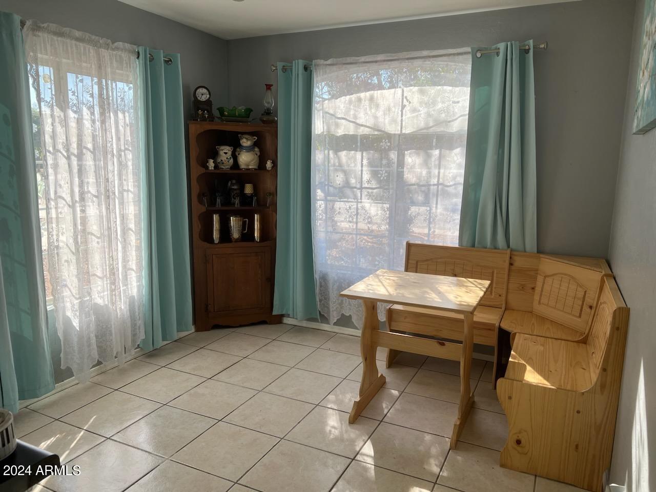 11962 West Coronado Road Avondale, AZ 85392 - Photo 6 of 23 a room with pool table and windows