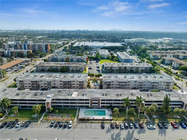 an aerial view of a building with outdoor space
