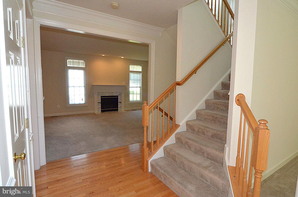 23506 Clarksburg Road Clarksburg, MD 20871 - Photo 13 of 29 a view of entryway and hall with wooden floor
