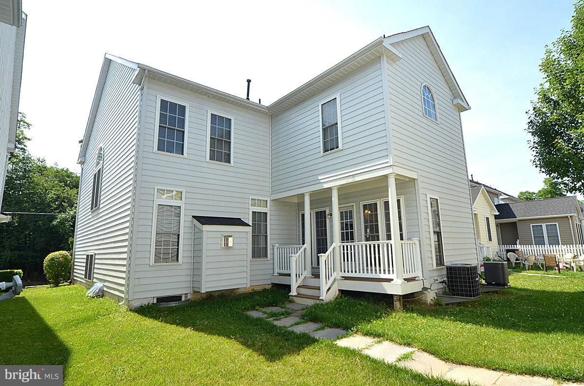 23506 Clarksburg Road Clarksburg, MD 20871 - Photo 28 of 29 a view of a house with a yard