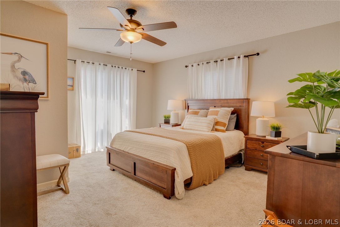 775 Winn Road, Unit 4L Osage Beach, MO 65065 - Photo 19 of 39 Master bedroom