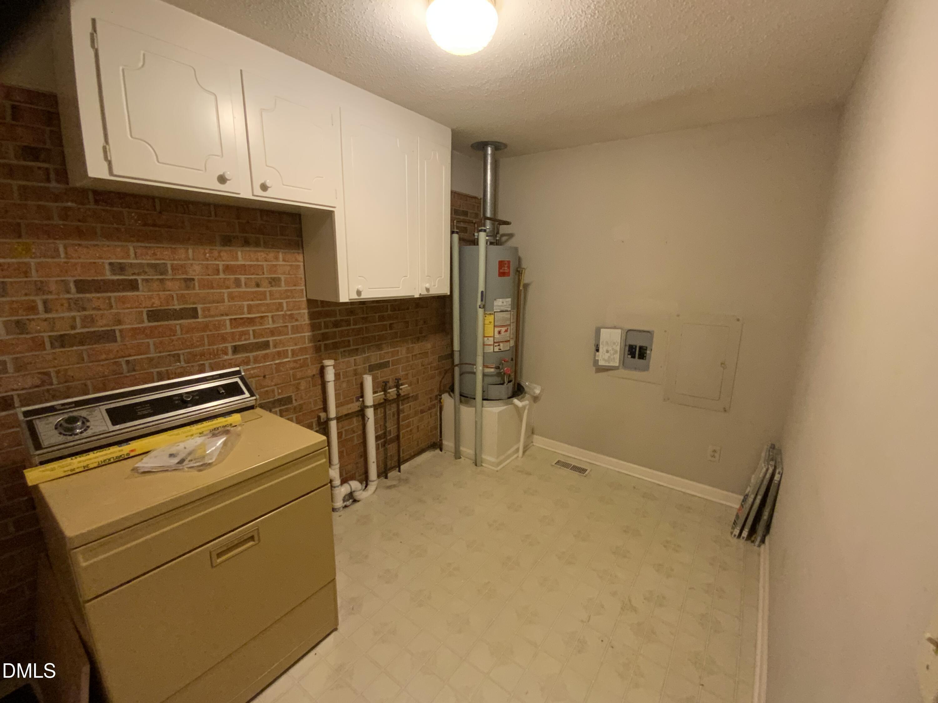 100 East C Street Erwin, NC 28339 - Photo 18 of 21 a room with storage and utility