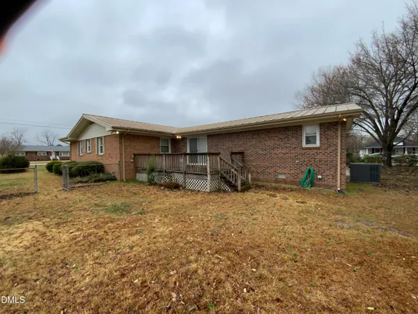 a house view with a backyard space