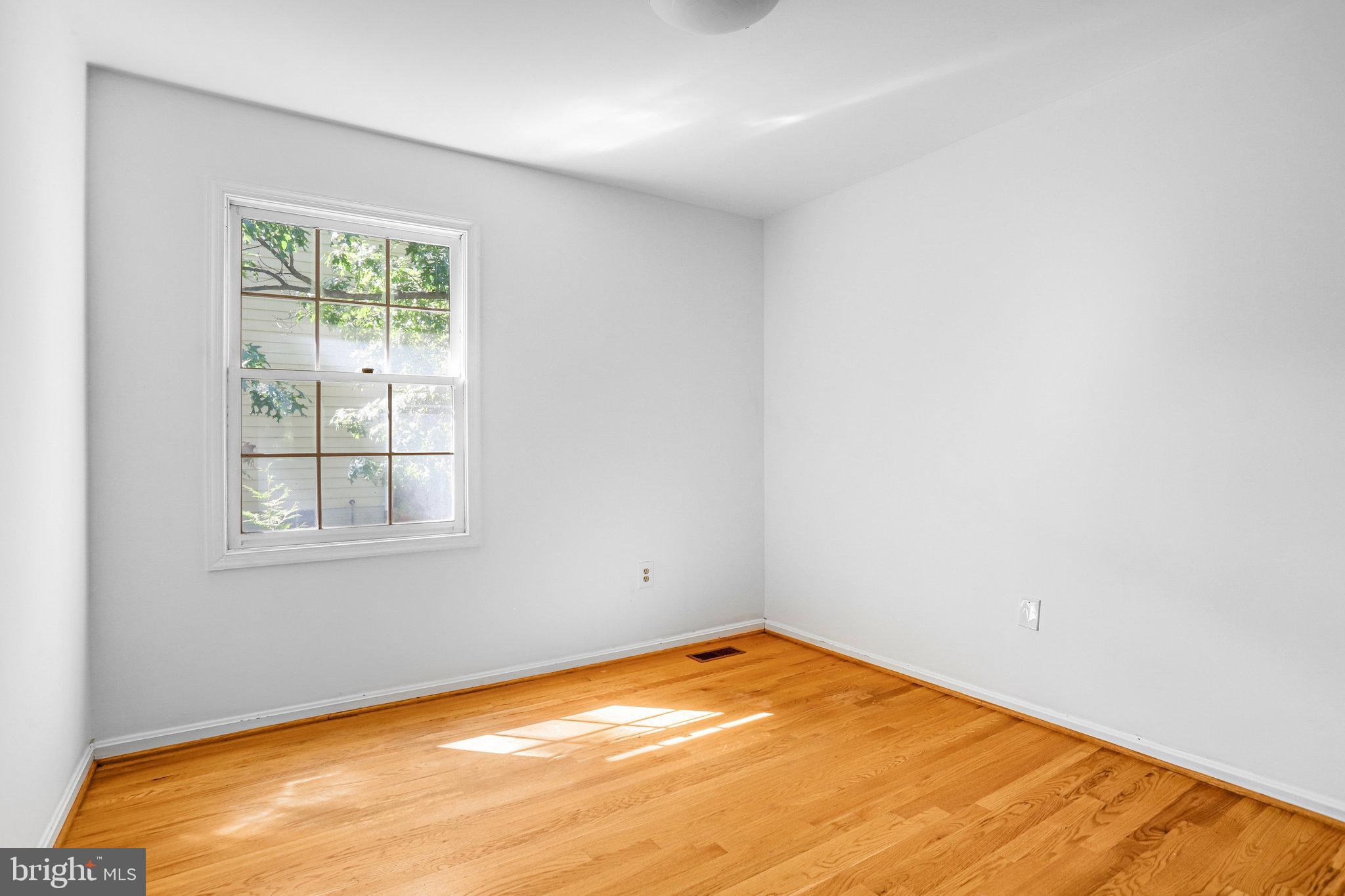 6935 Pineway Hyattsville, MD 20782 - Photo 9 of 14 an empty room with a window