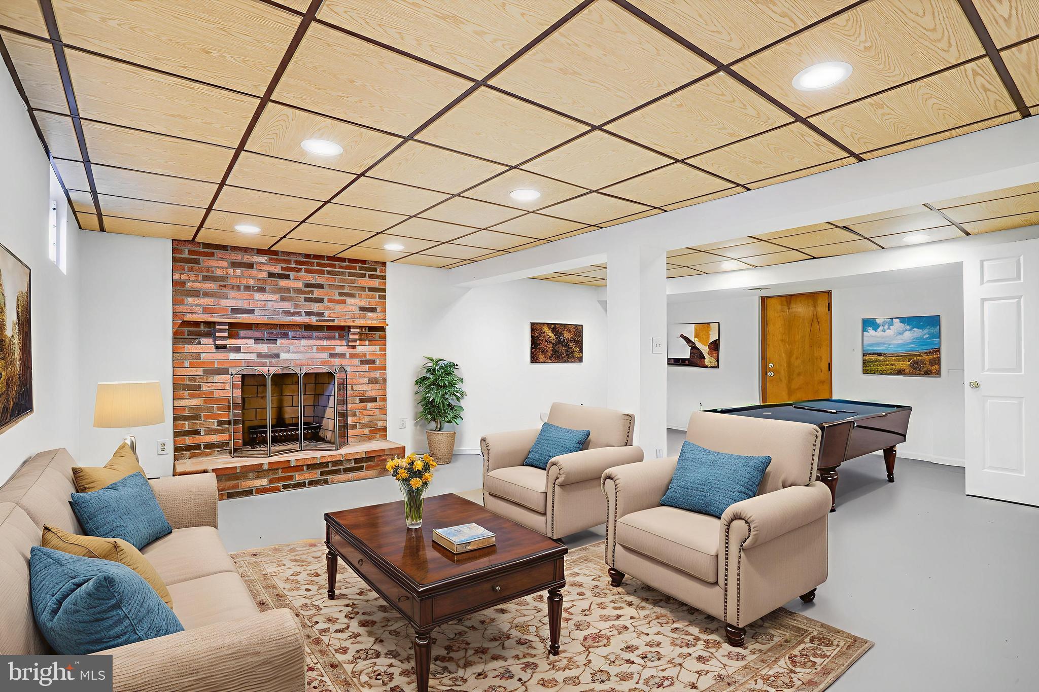 6935 Pineway Hyattsville, MD 20782 - Photo 10 of 14 a living room with furniture and a large window