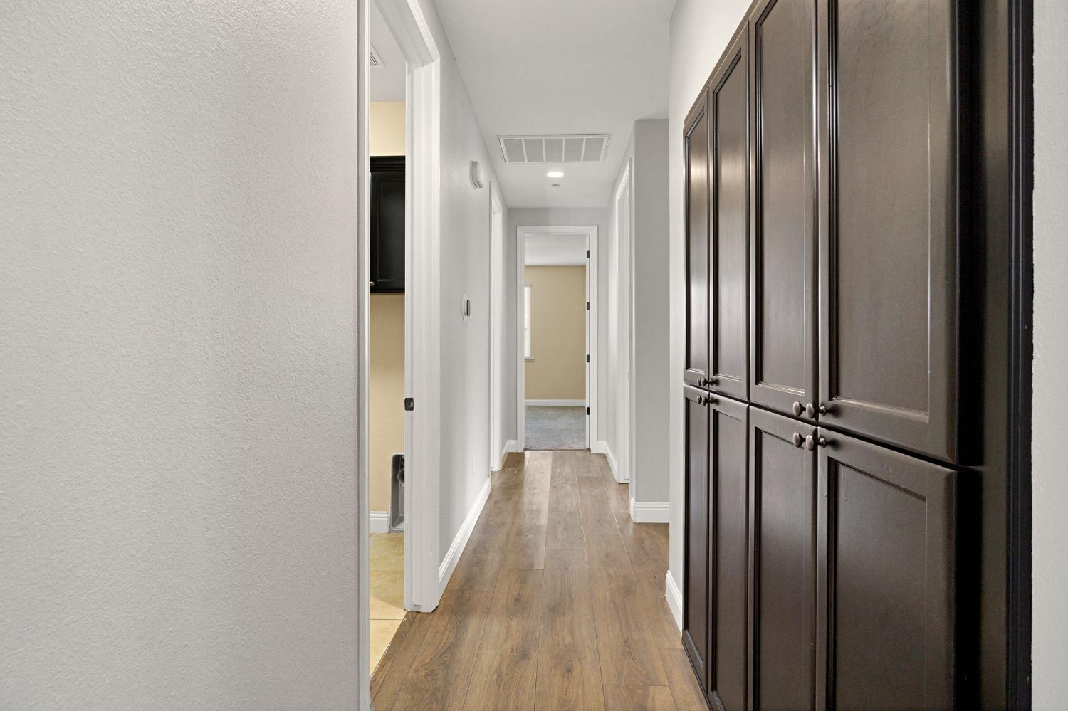 798 South Michelle Avenue Kerman, CA 93630 - Photo 17 of 33 Hallway cabinets