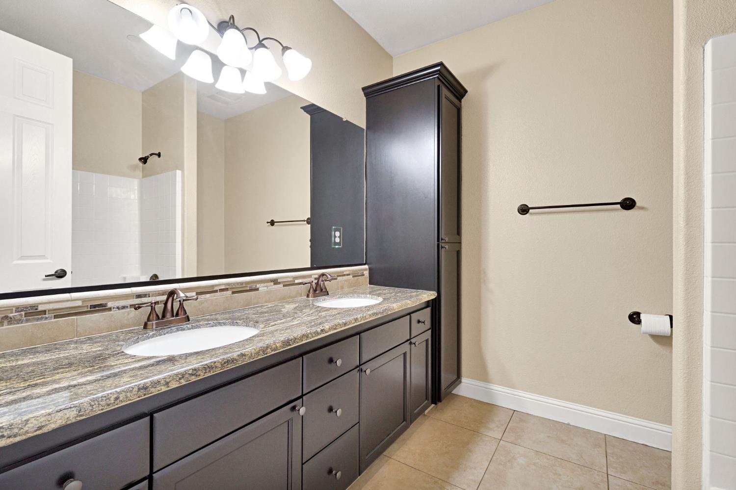 798 South Michelle Avenue Kerman, CA 93630 - Photo 21 of 33 Double sink vanity with extra storage