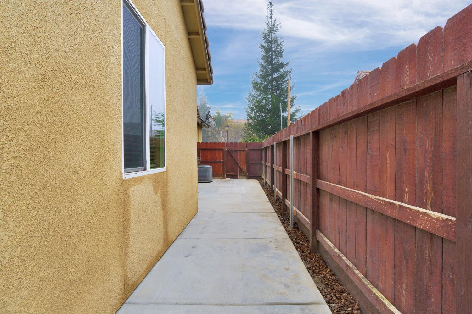 798 South Michelle Avenue Kerman, CA 93630 - Photo 33 of 33 Extra cement around the house