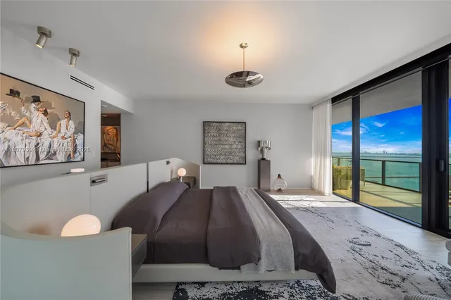a bathroom with a sink a toilet and bathtub